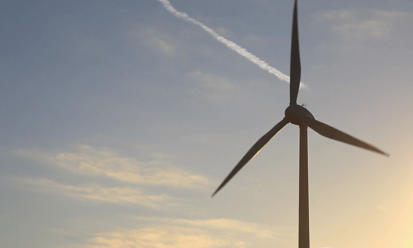 A wind turbine in a field